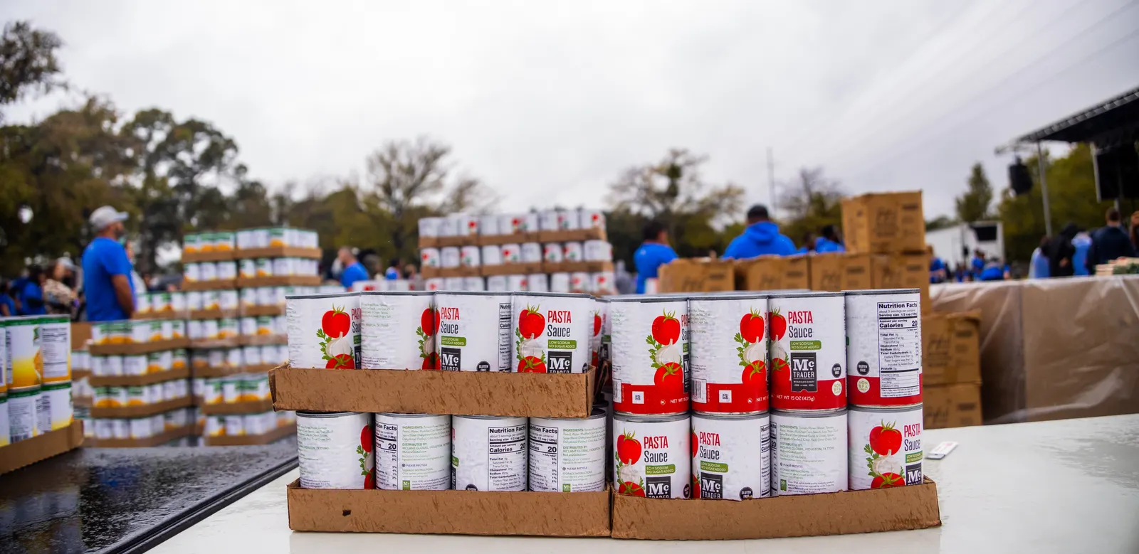 Volunteers preparing food for a community outreach event